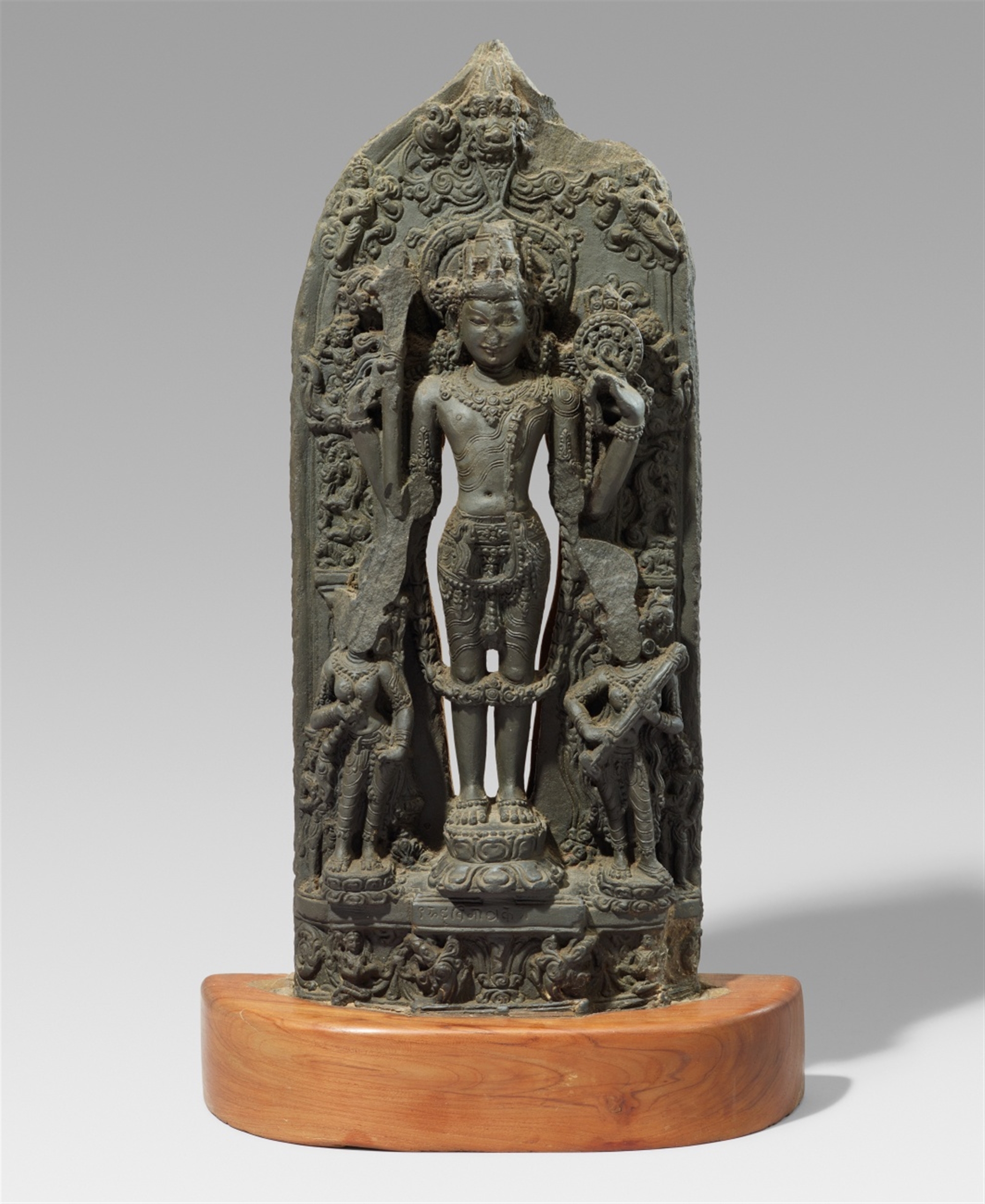 A Pala-style blackened stone stele of Vishnu. Northeastern India, Bihar, possibly 12th century