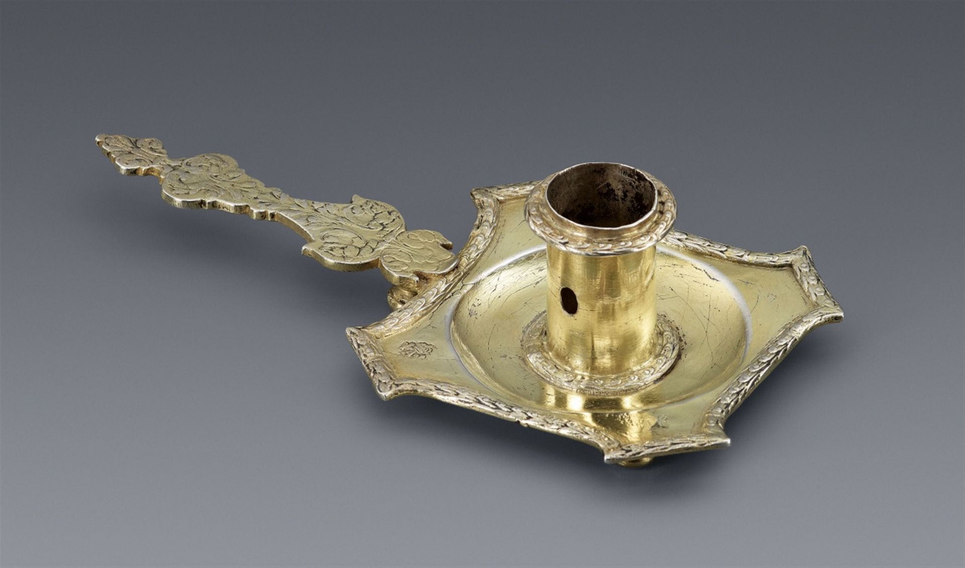 An early Parisian silver gilt chamberstick