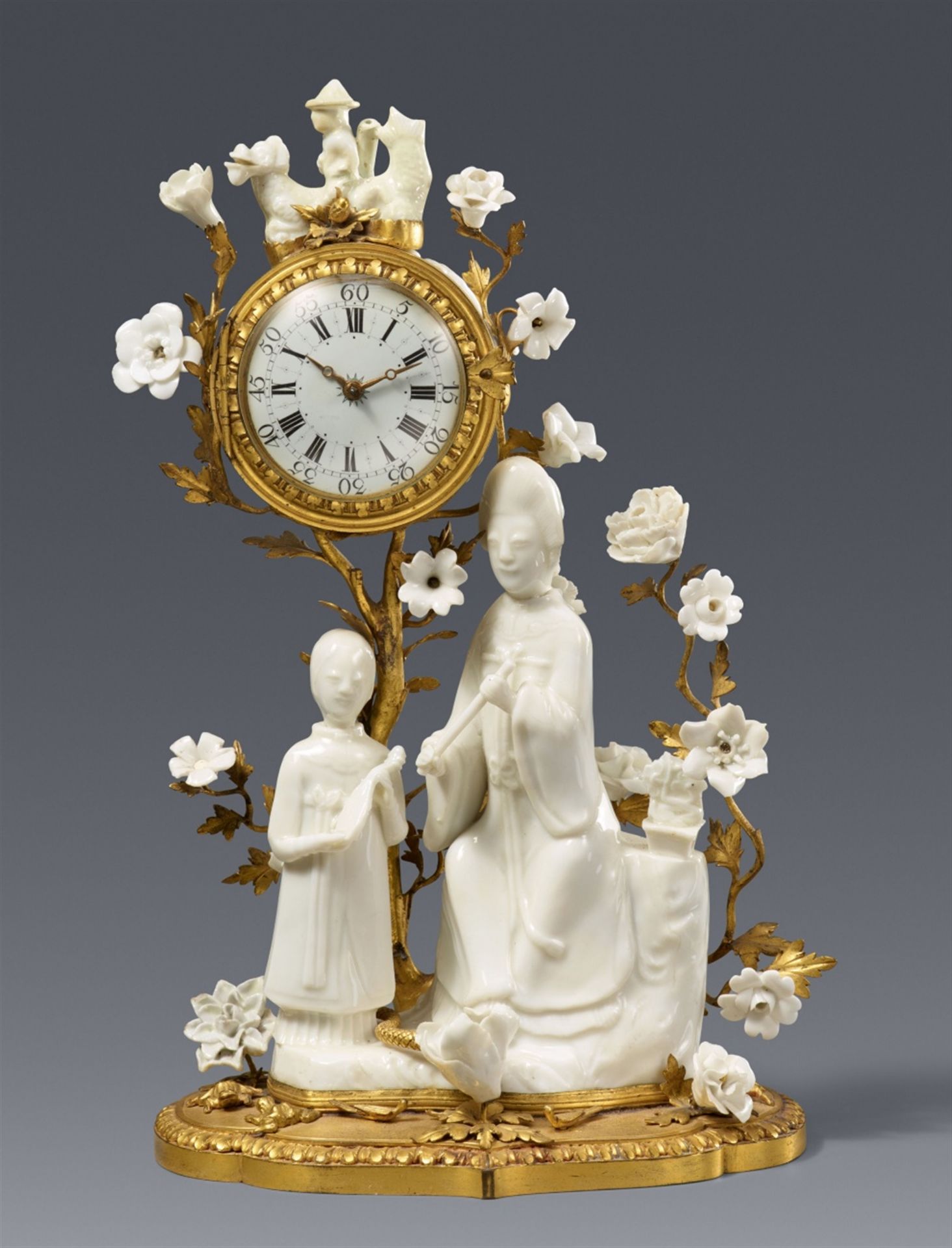 An ormolu pendulum clockwatch with Dehua blanc de Chine figures. Kangxi period (1662-1722), clock by