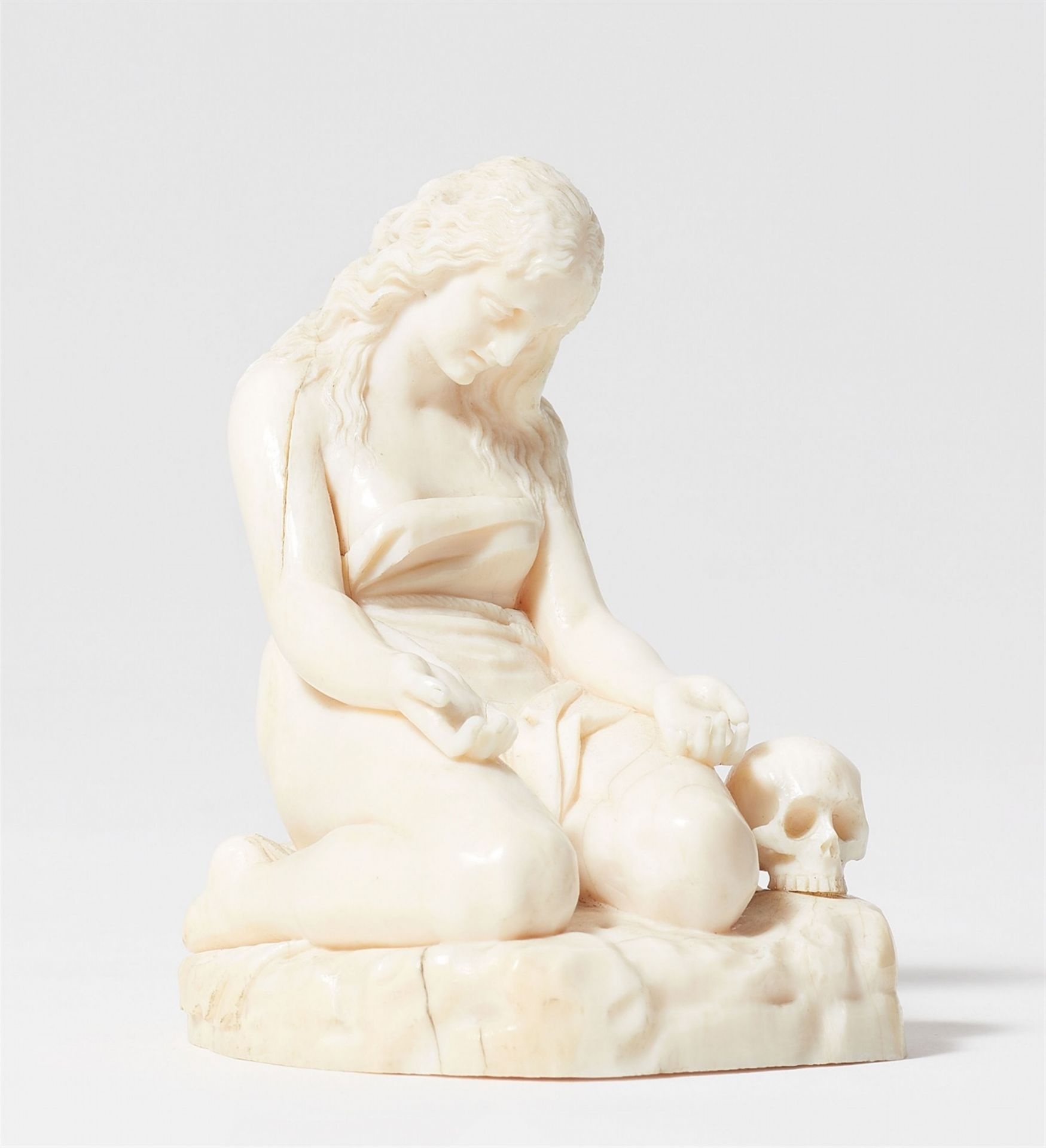 An Italian carved ivory figure of the penitent Mary Magdalene, around 1800/1810