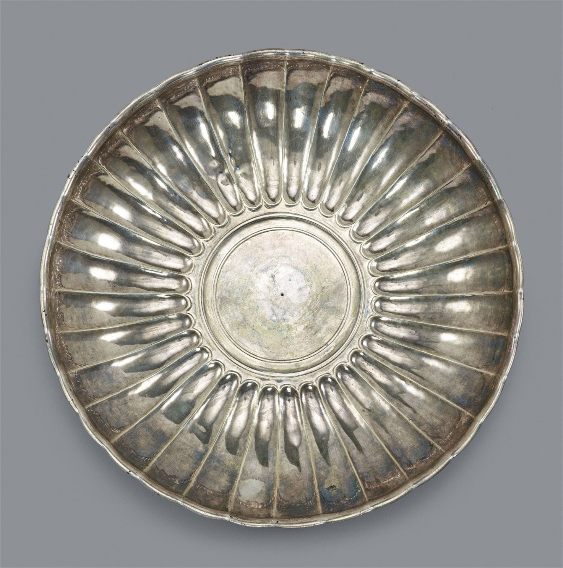 A rare gadrooned Roman silver dish