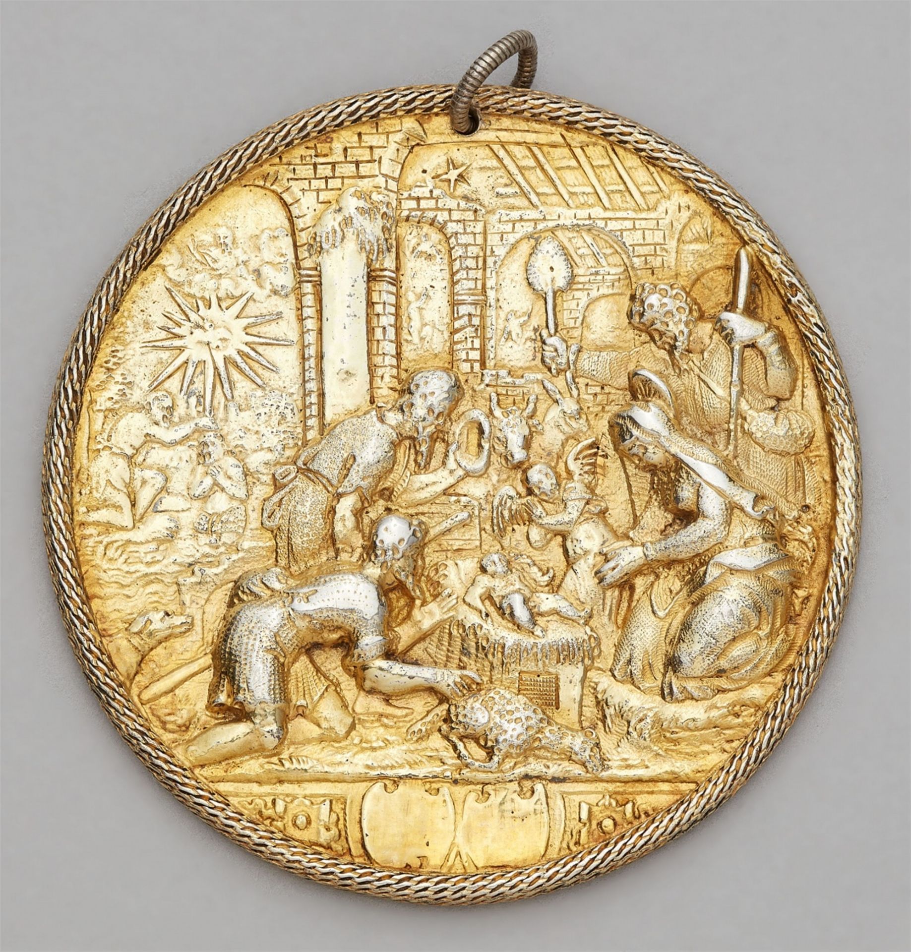 An important silver gilt medallion with the adoration of the shepherds, Gift for the birth of Regina