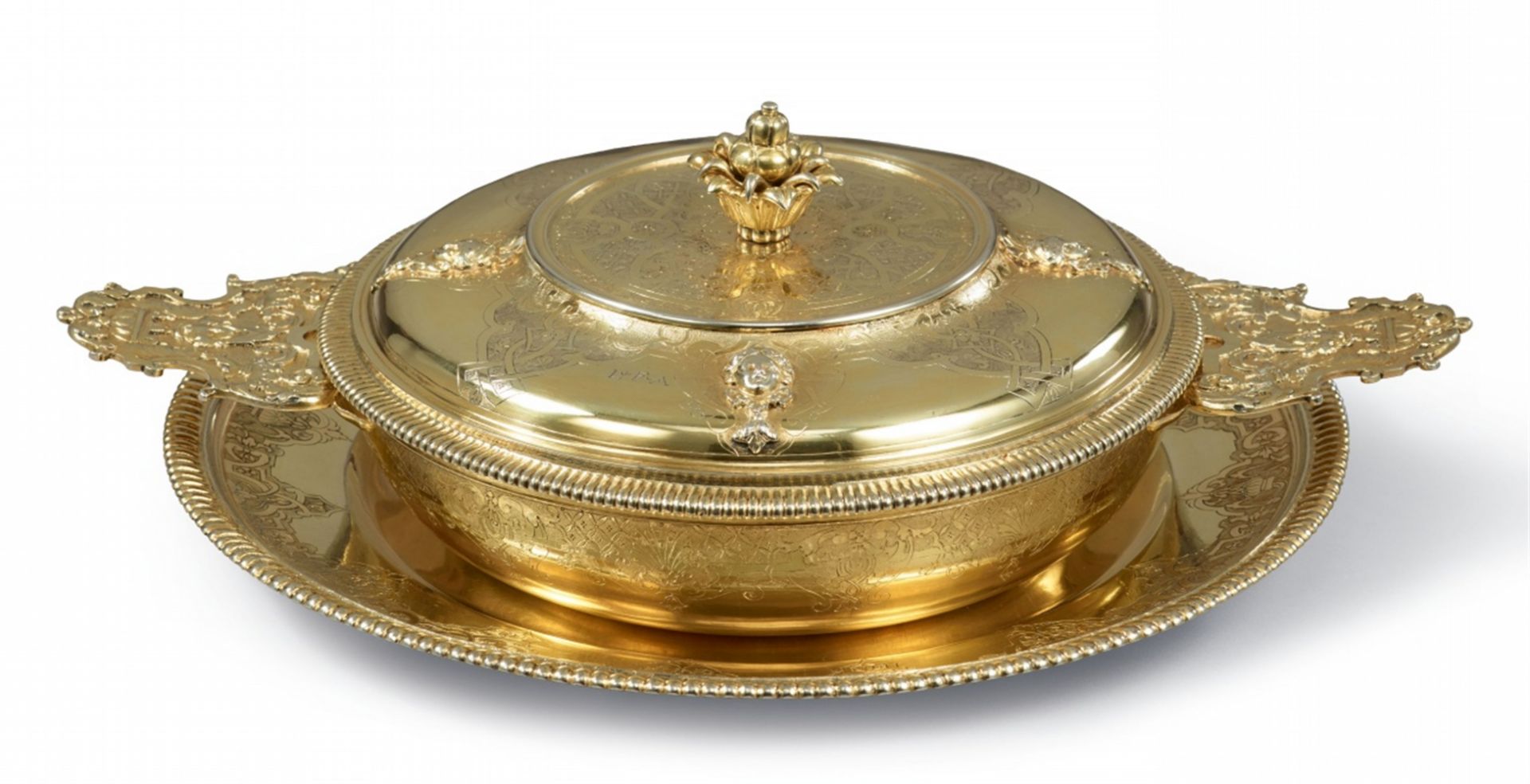 A rare Strasbourg Régence silver gilt ecuelle and stand