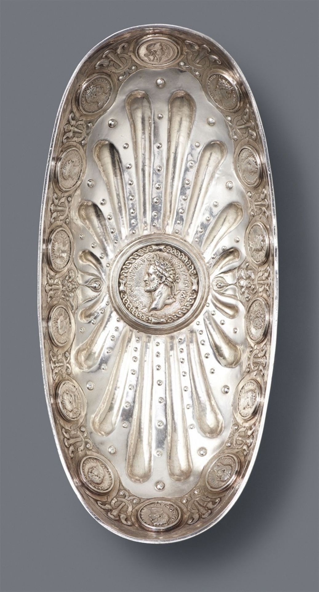 An Antwerp Renaissance silver bowl with Roman coins