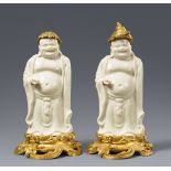 Zwei blanc de Chine-Figuren eines Budai in französischer Louis XV Ormolu-Montierung. Dehua. Kangxi-P