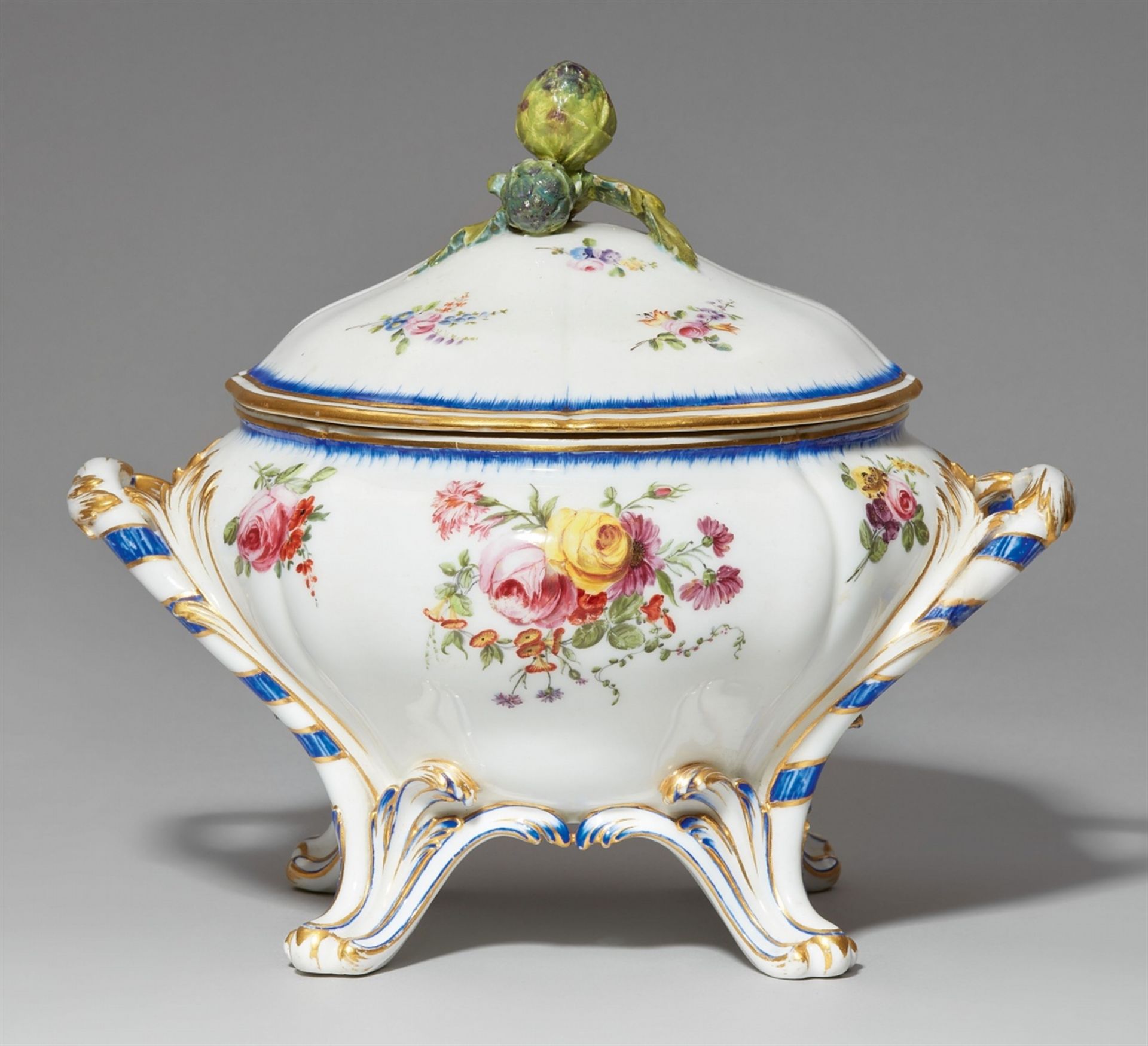 A Sèvres soft-paste porcelain “pot à oille” tureen from a service with bouquets