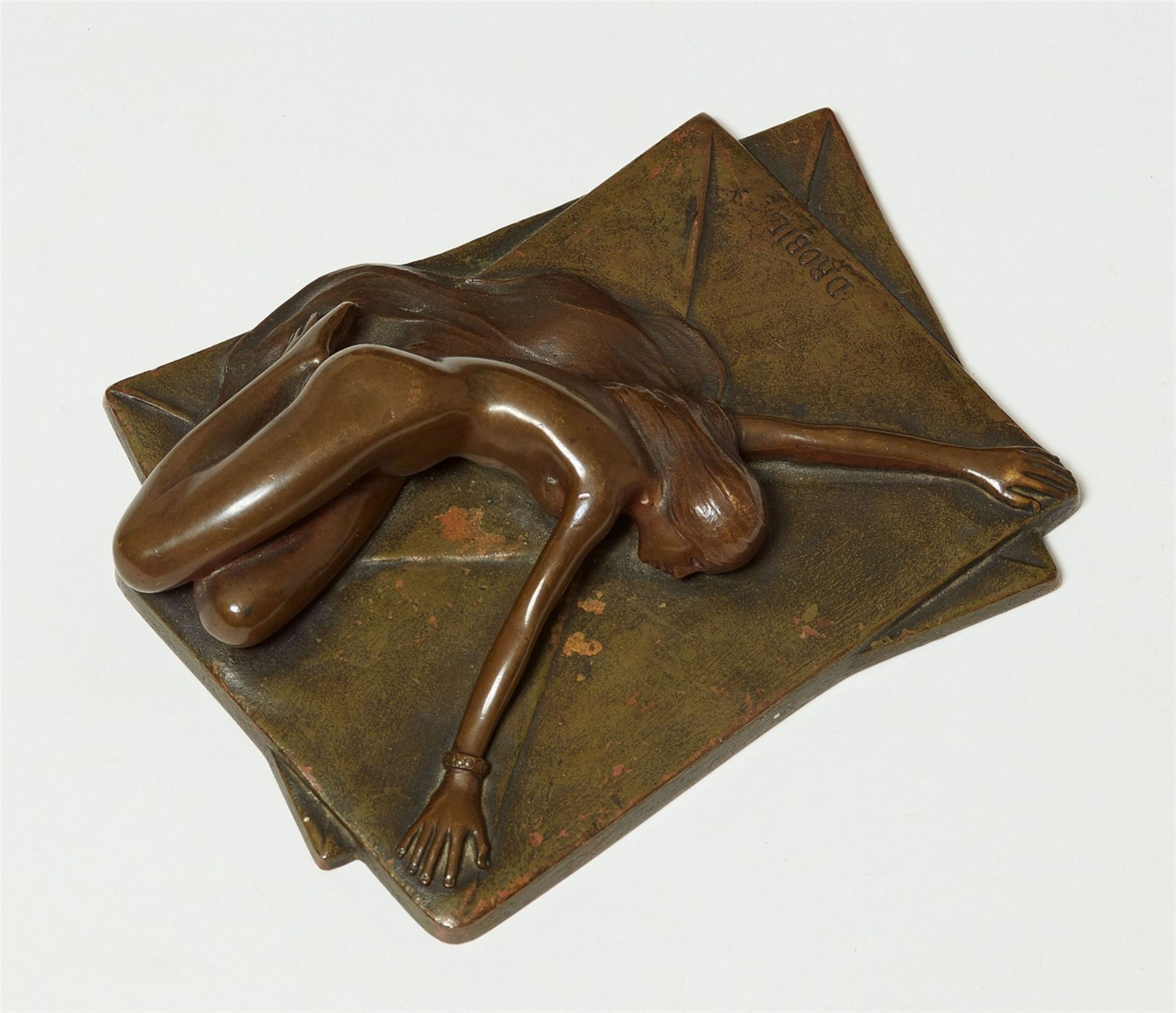 A bronze paperweight