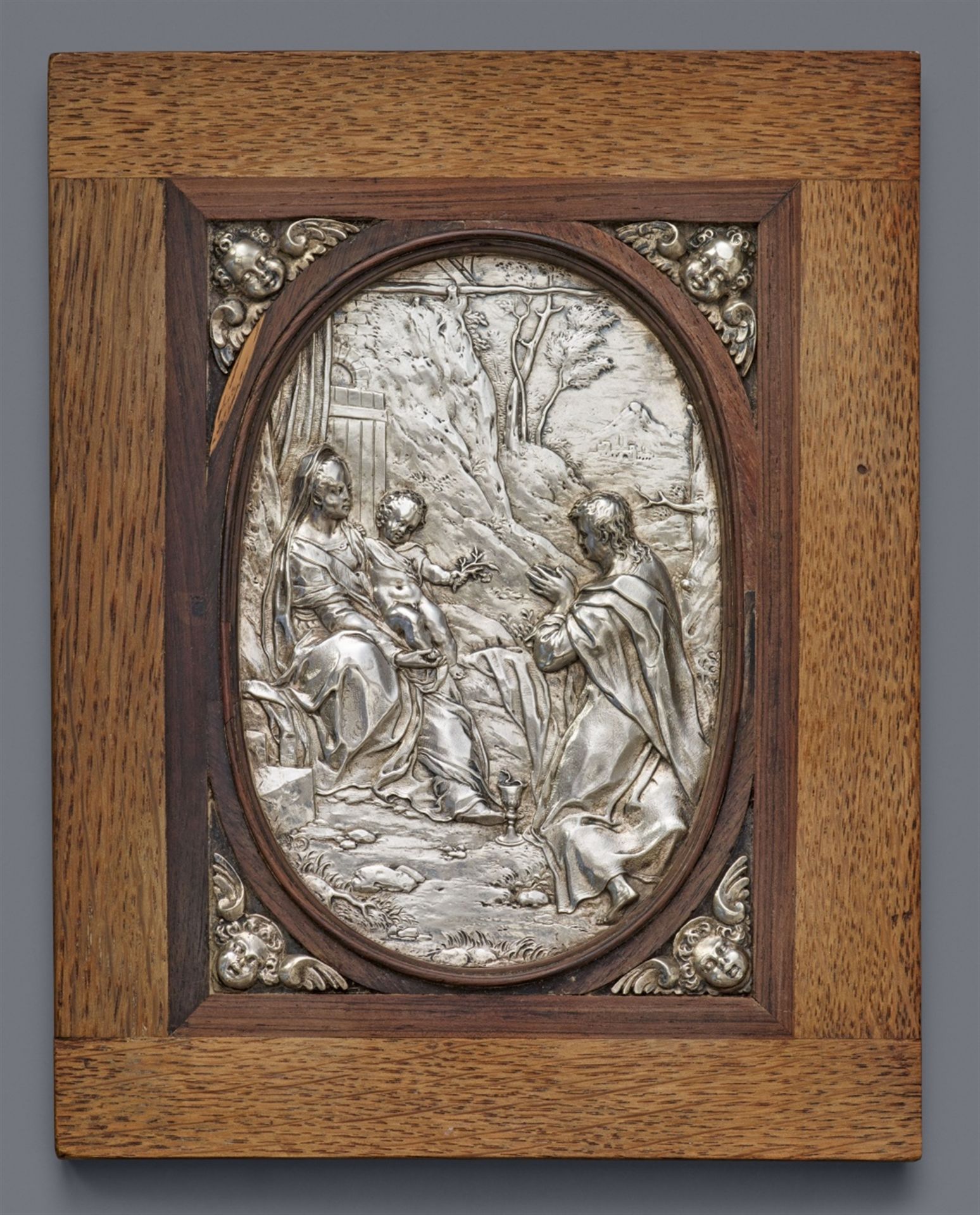 An Augsburg silver relief with Saint John the Apostle adoring the Virgin