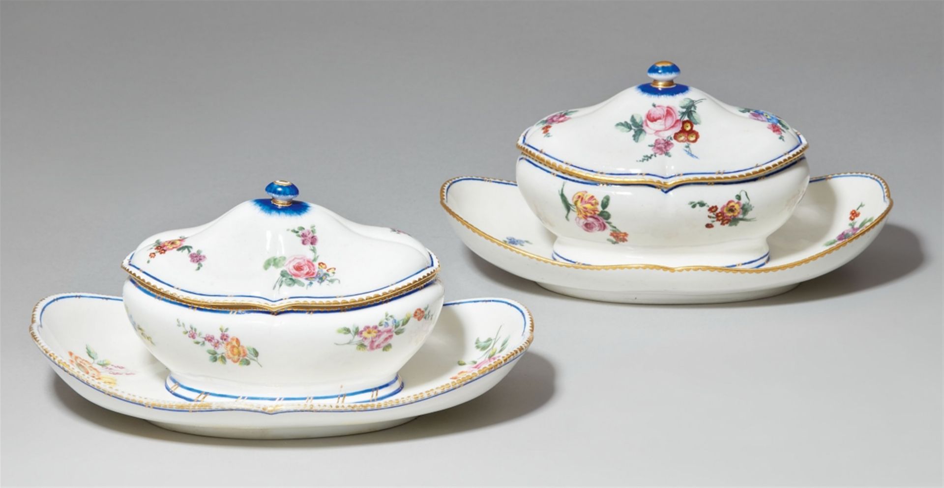 Two Sèvres soft-paste porcelain sugar boxes and covers with flowers