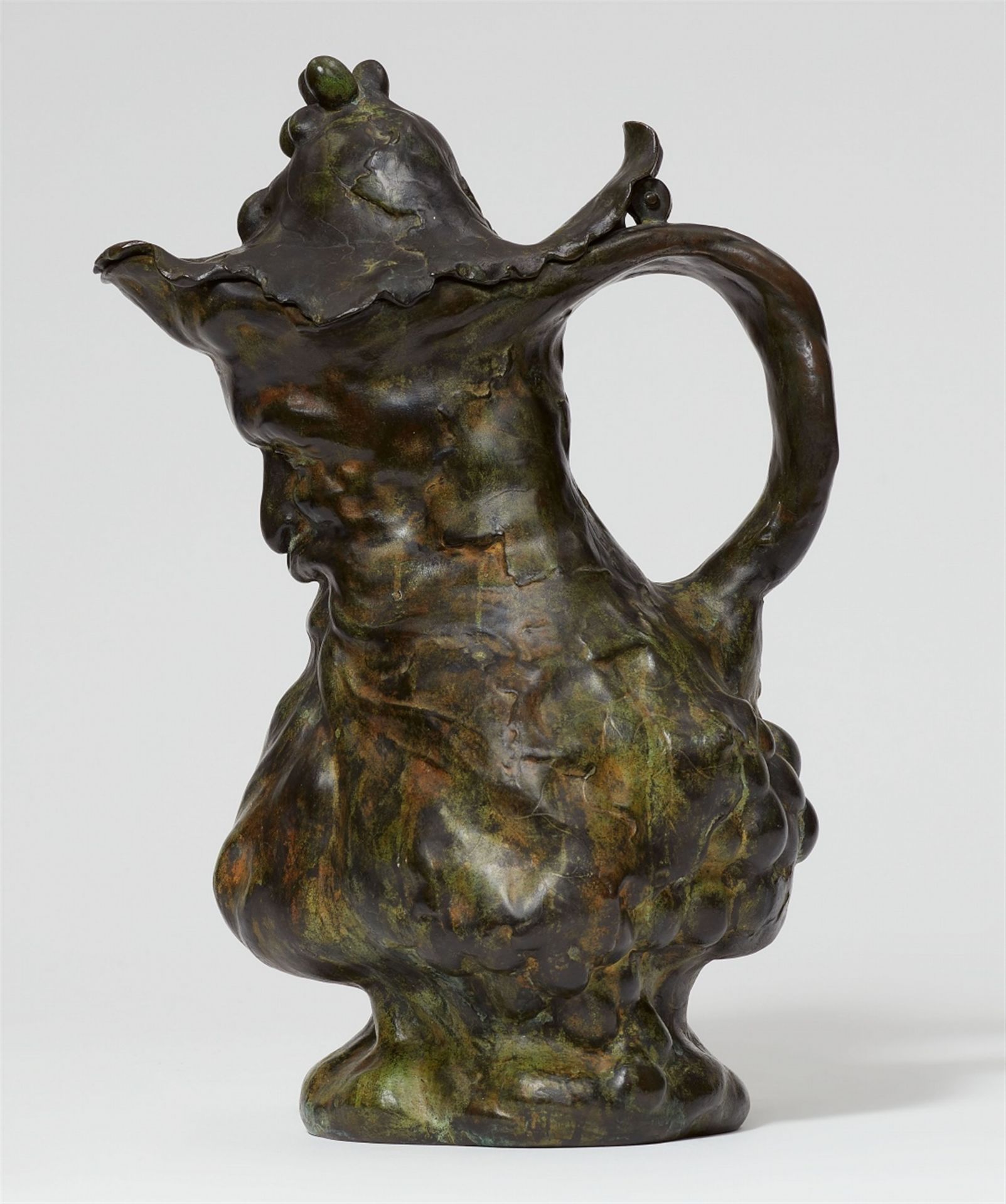 A bronze jug by Philippe Wolfers, “Le vin”