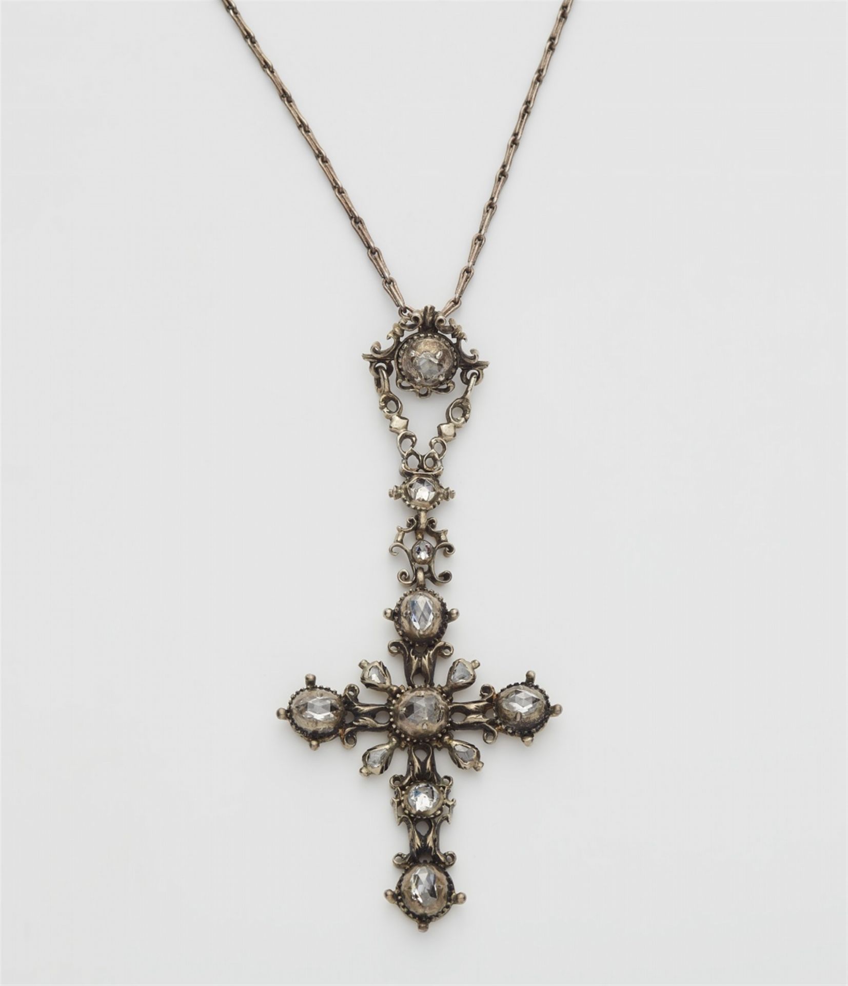 A Rococo parcel gilt silver cross pendant