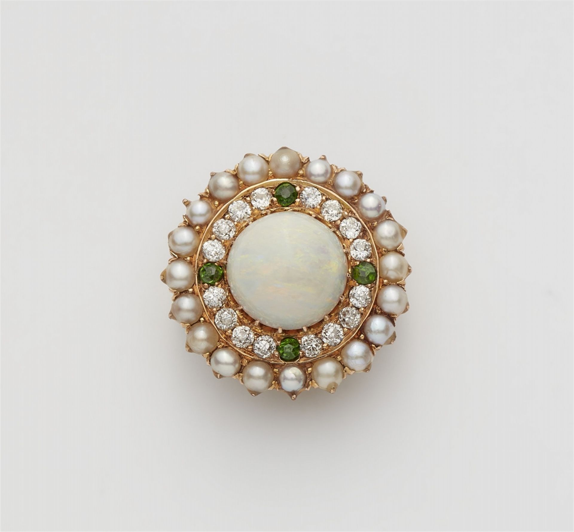A 14k red and yellow gold opal rosette brooch