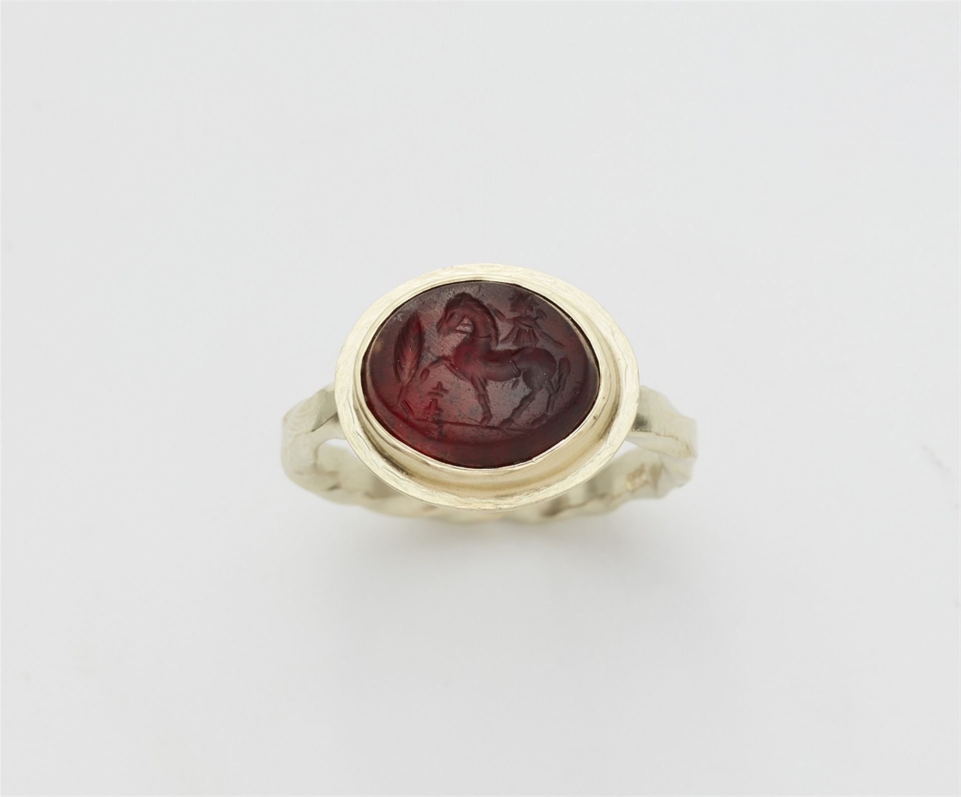 A 14k gold gentleman's ring with a Roman intaglio