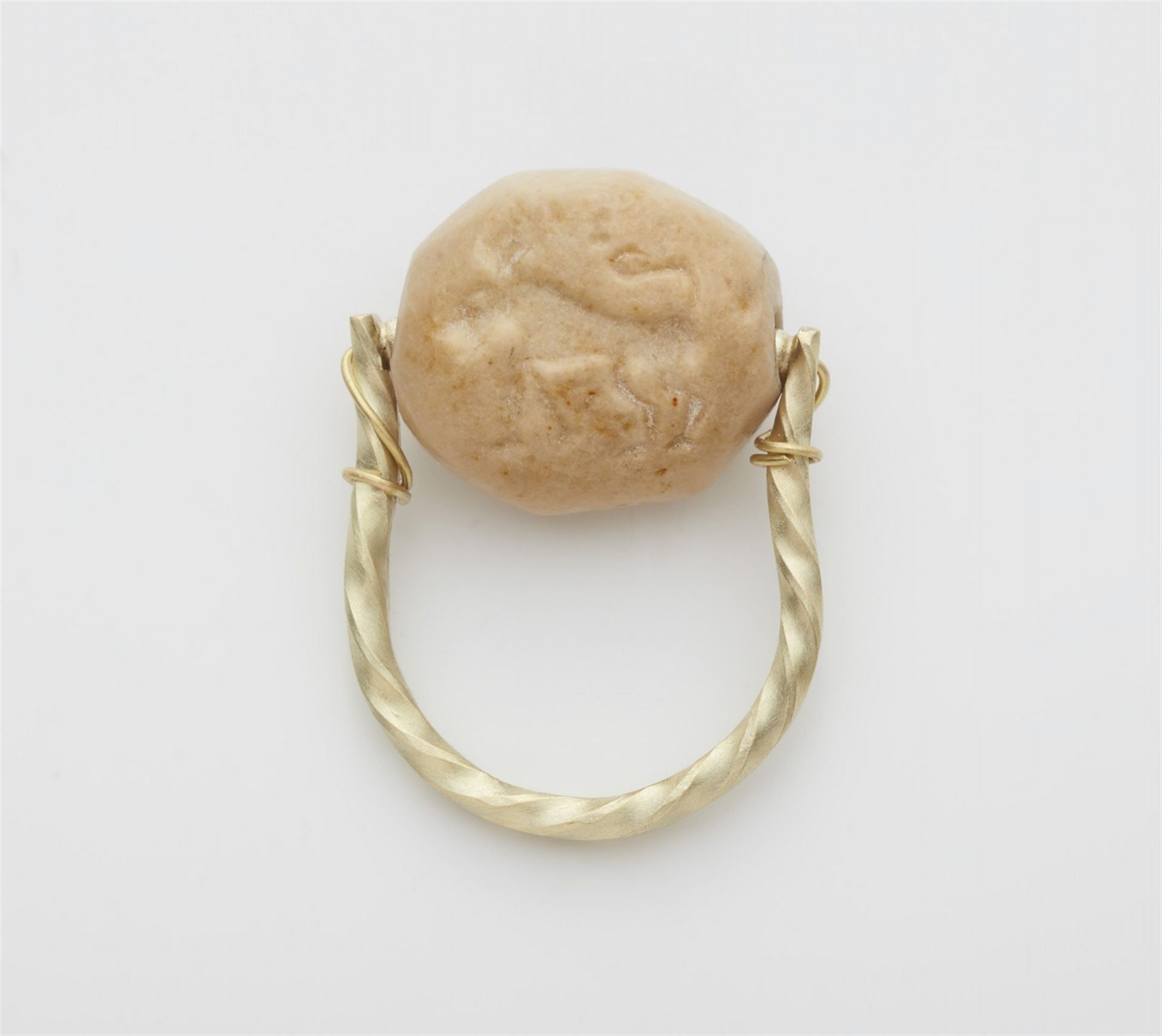 A 14k gold ring with an ancient intaglio