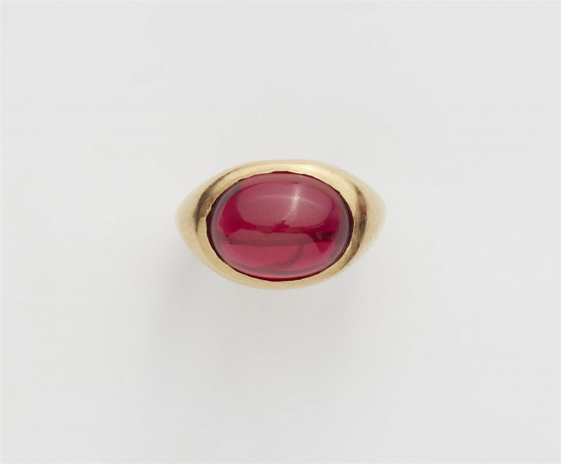 An 18k gold ring with a verneil ruby