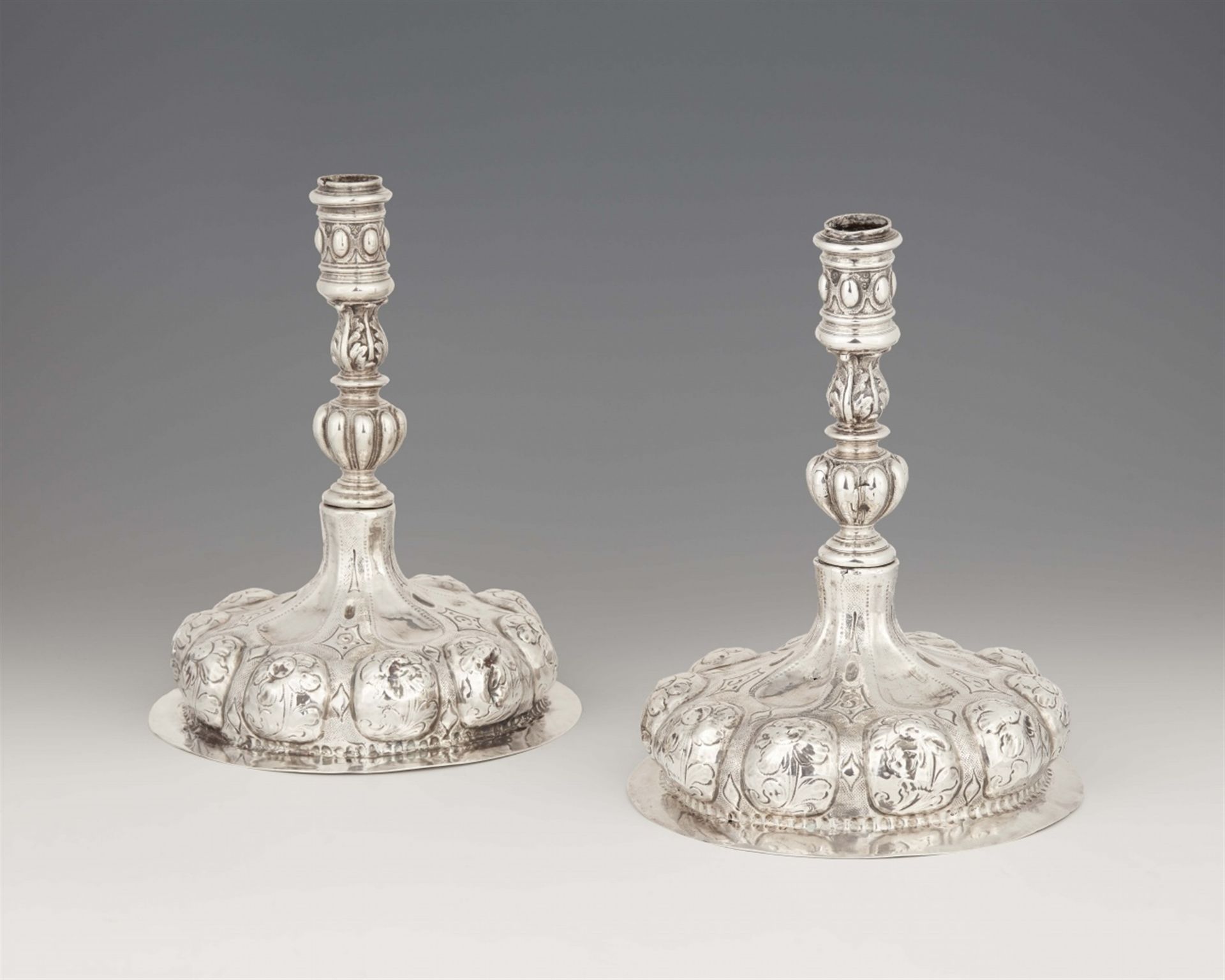 An early pair of Venetian silver candlesticks