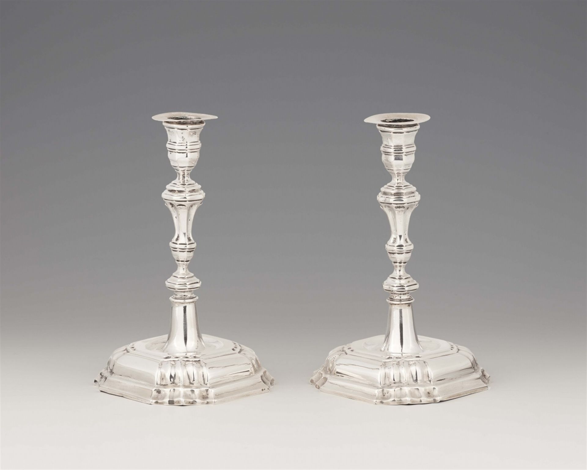 A pair of Augsburg silver candlesticks