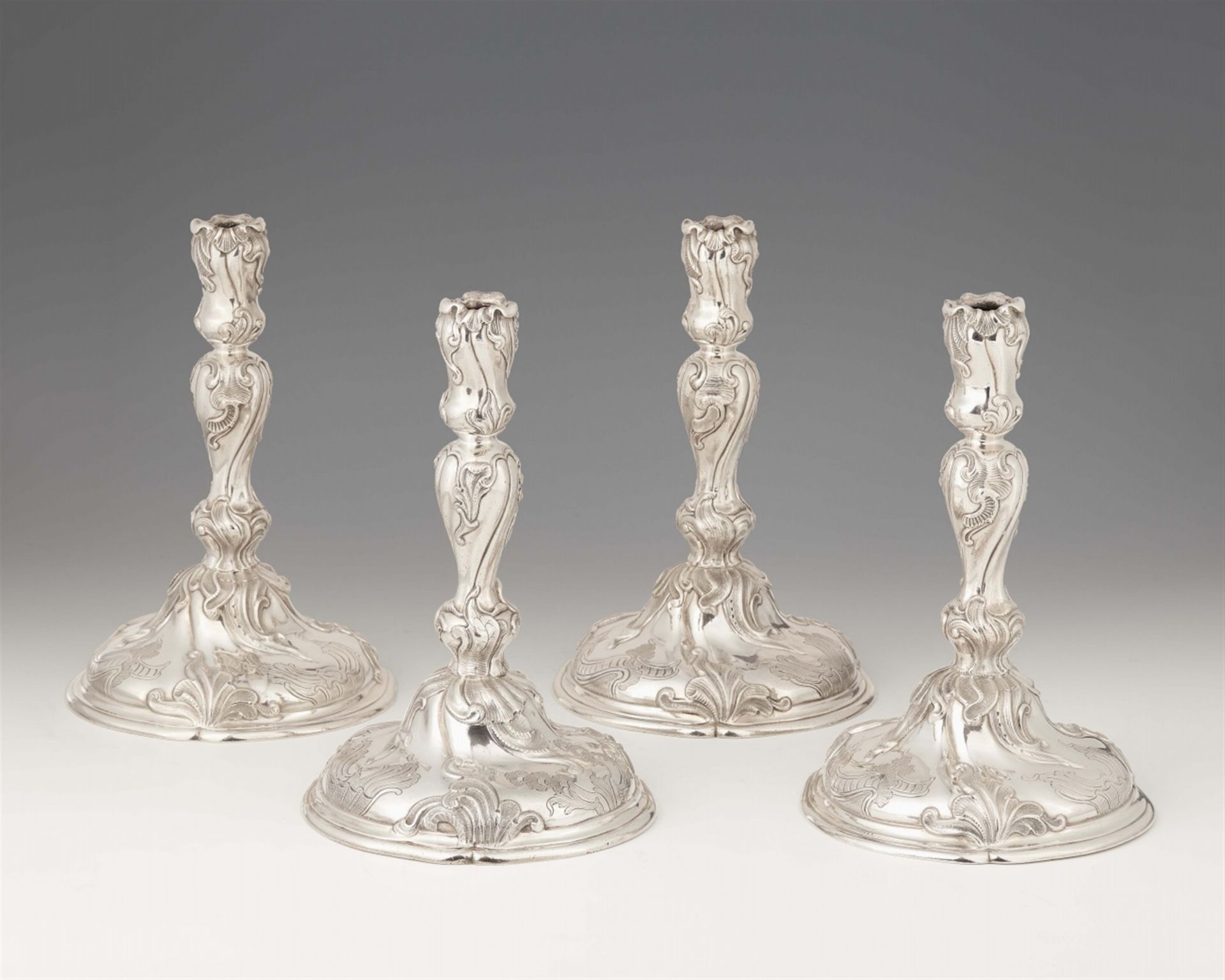 A set of four Dresden silver candlesticks made for Prince Elector August II of Saxony