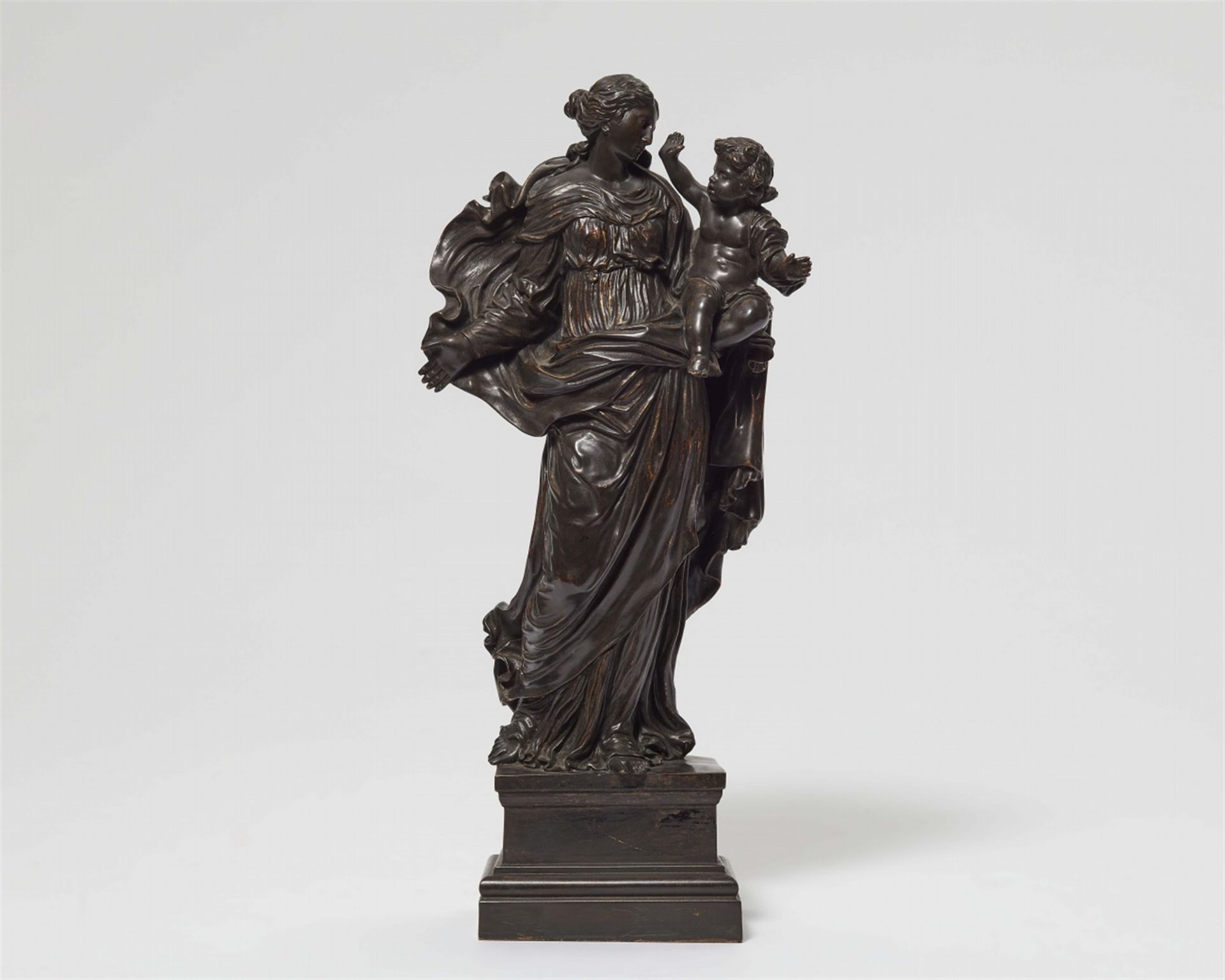 A bronze group of the Virgin and Child