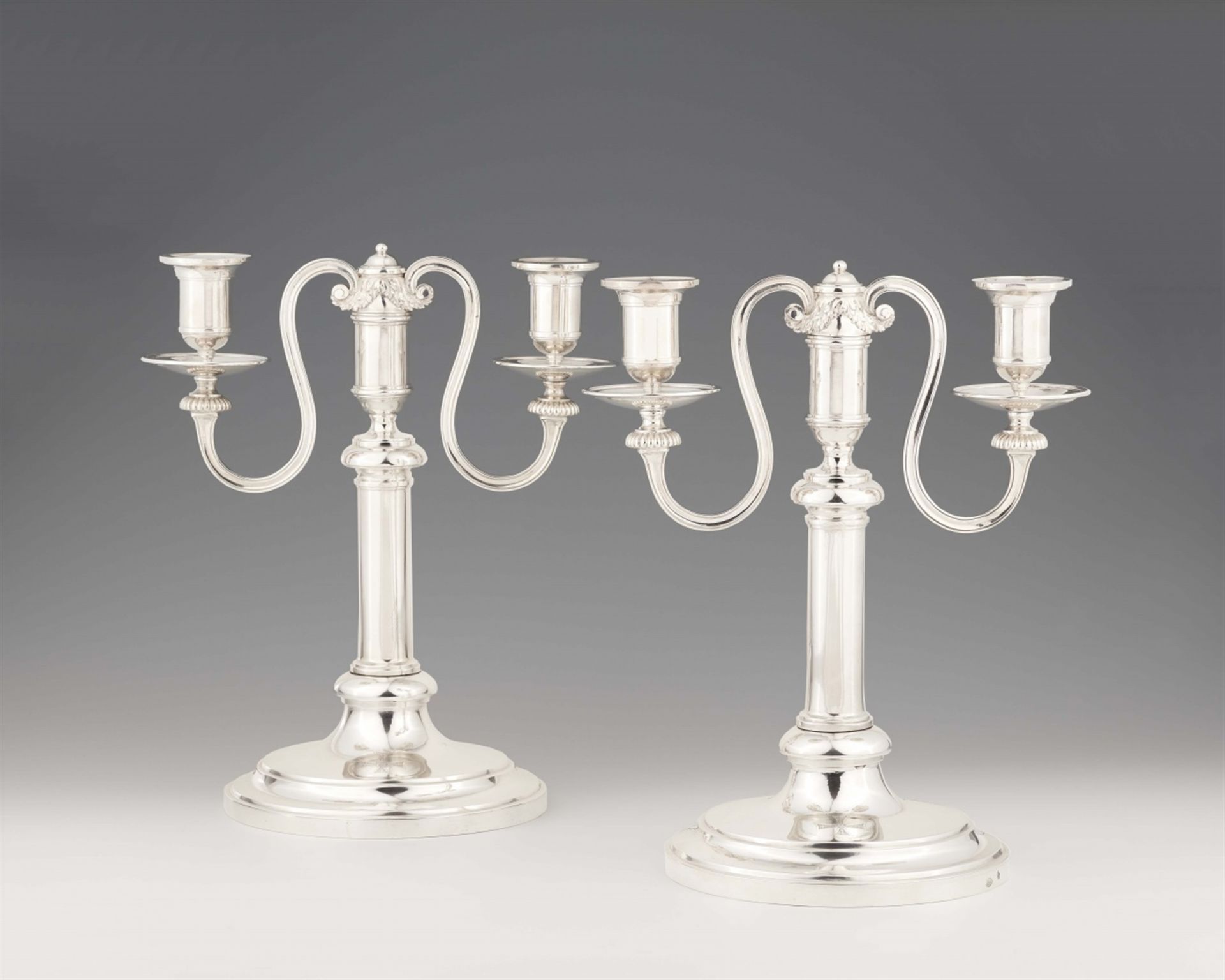 A pair of Bonn silver candelabra made for the Grand Master of the Teutonic Order