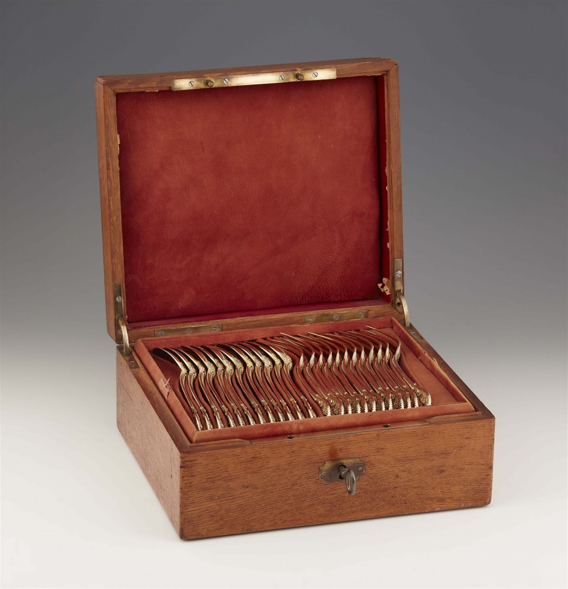 A set of Parisian silver gilt dessert cutlery in a fitted case