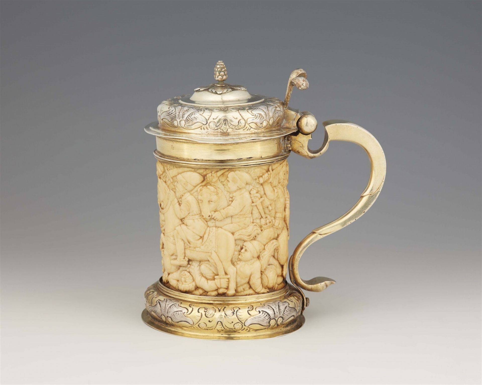A silver mounted ivory tankard