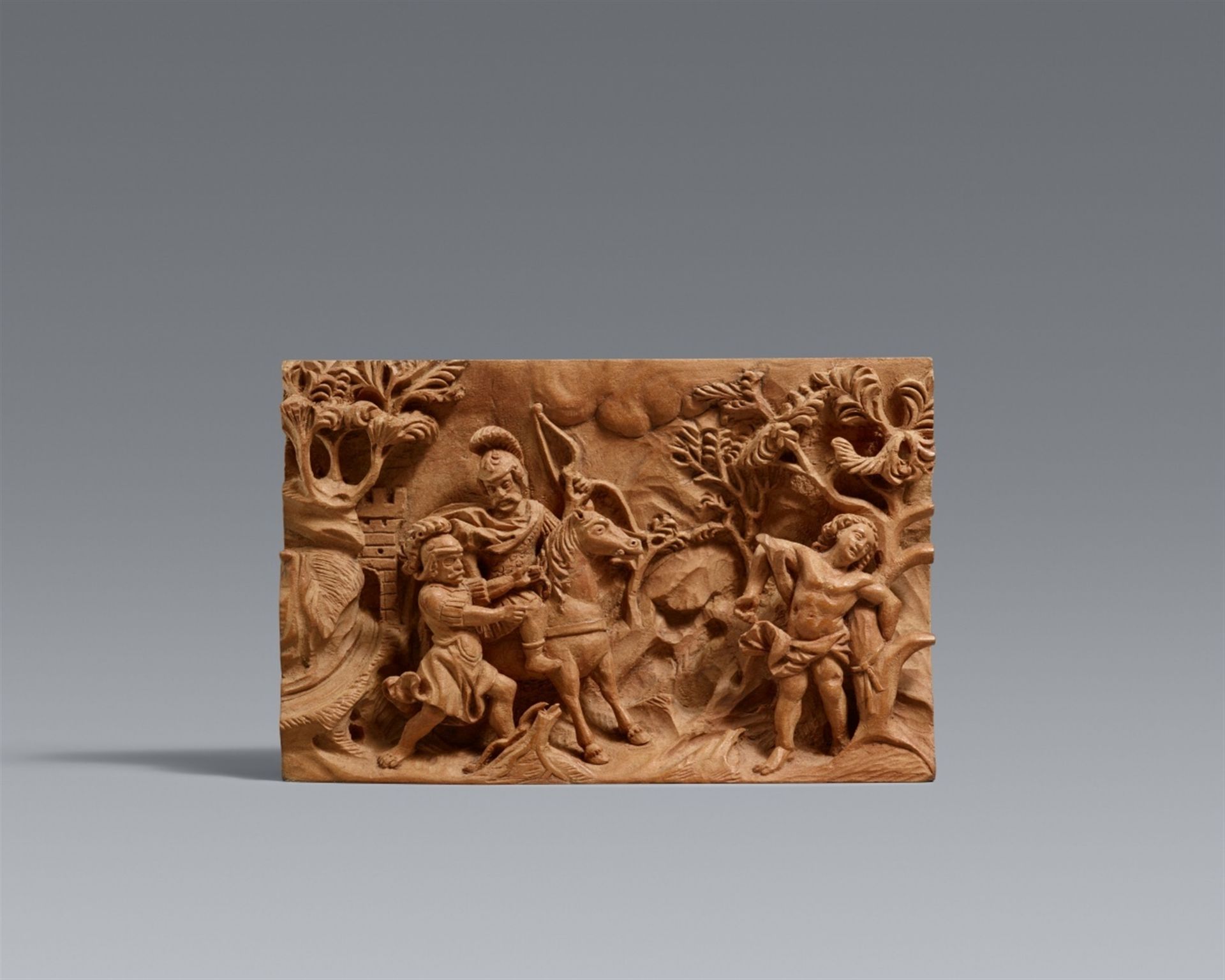 An early 18th century South German carved boxwood relief with the Martyrdom of Saint Sebastian