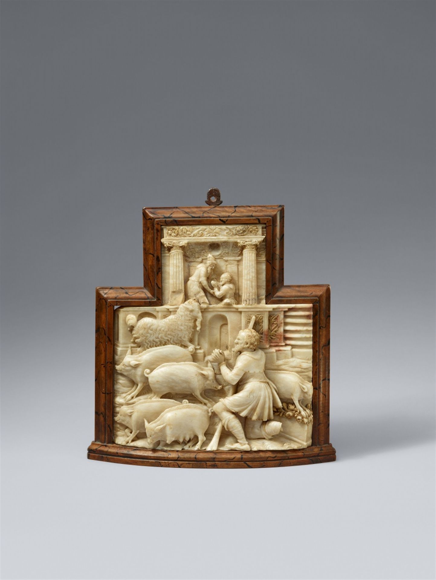 A mid-16th century Flemish alabaster relief with scenes from the parable of the prodigal son