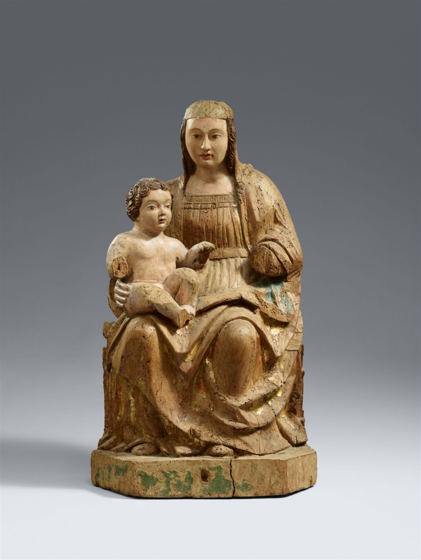 A North Italian carved wood figure of the Virgin Enthroned, 2nd half 15th century
