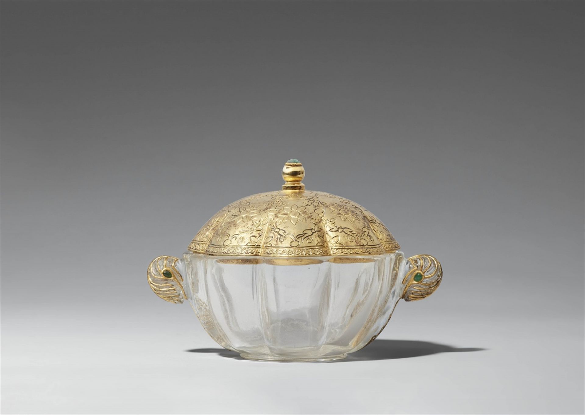 A North or Central Indian rock crystal bowl with a gilt metal lid