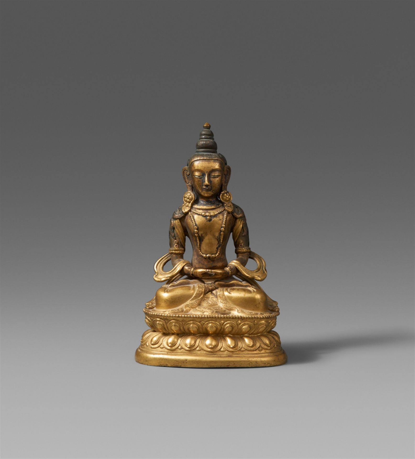 A Tibetochinese gilt bronze figure of Buddha Amitayus. 18th/19th century