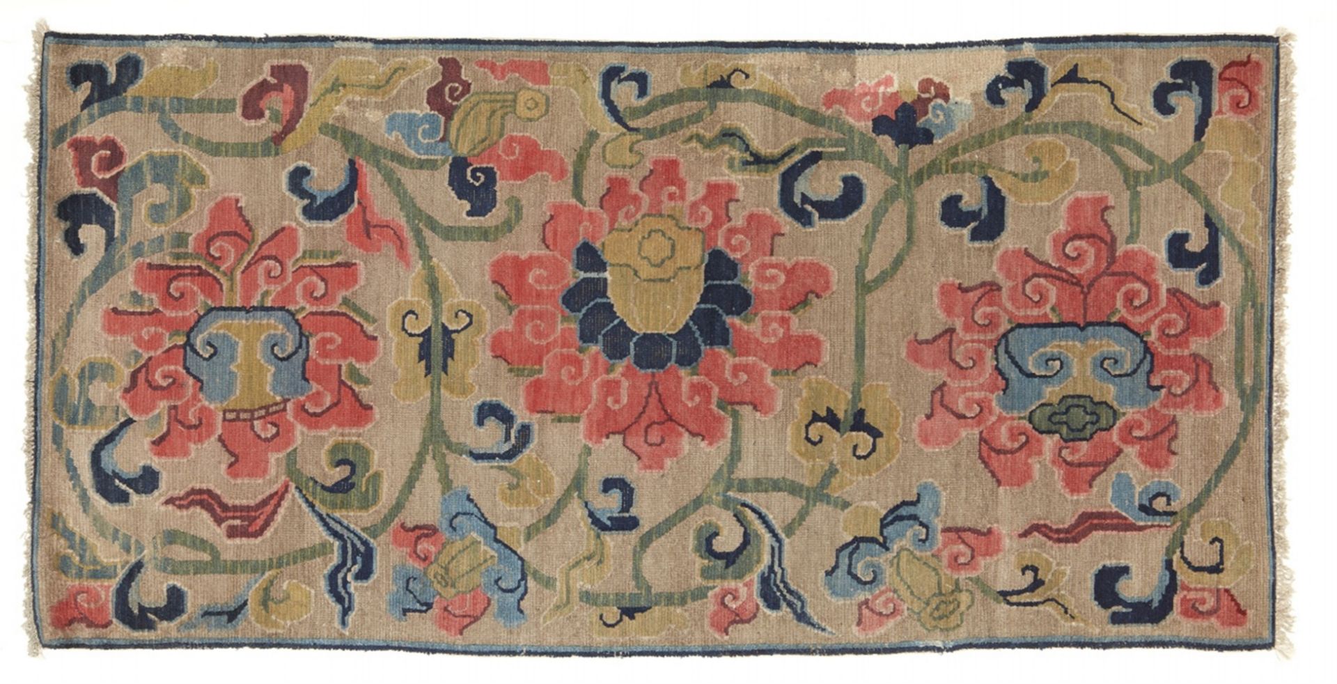A Tibetan wool lotos rug. Early 20th century