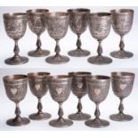 Set of 6 silver cups on pedestal base