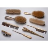 Set consisting of seven silver and other hairdressing objects
