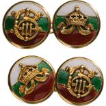 A pair of cufflinks with royal monogram