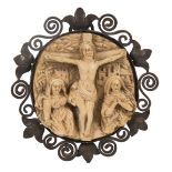 "Calvary". Sculpted ivory medallion with silver frame. 17th. Century.