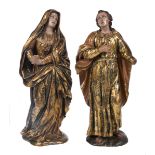 "Our Lady of Sorrows and Saint John". Pair of carved, gilded, estofado technique and polychromed sc