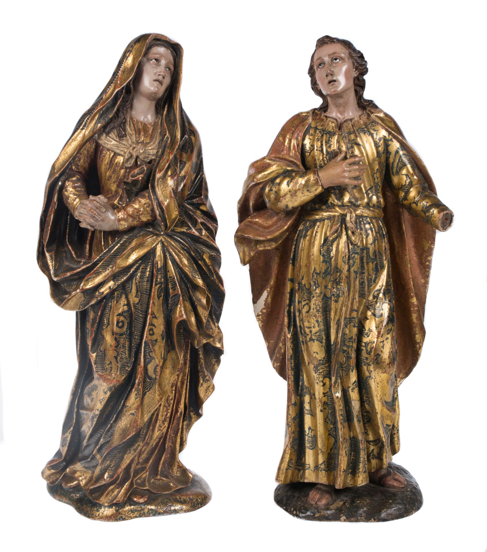 "Our Lady of Sorrows and Saint John". Pair of carved, gilded, estofado technique and polychromed sc