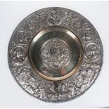 Large, embossed and chased silver plate. 19th century.