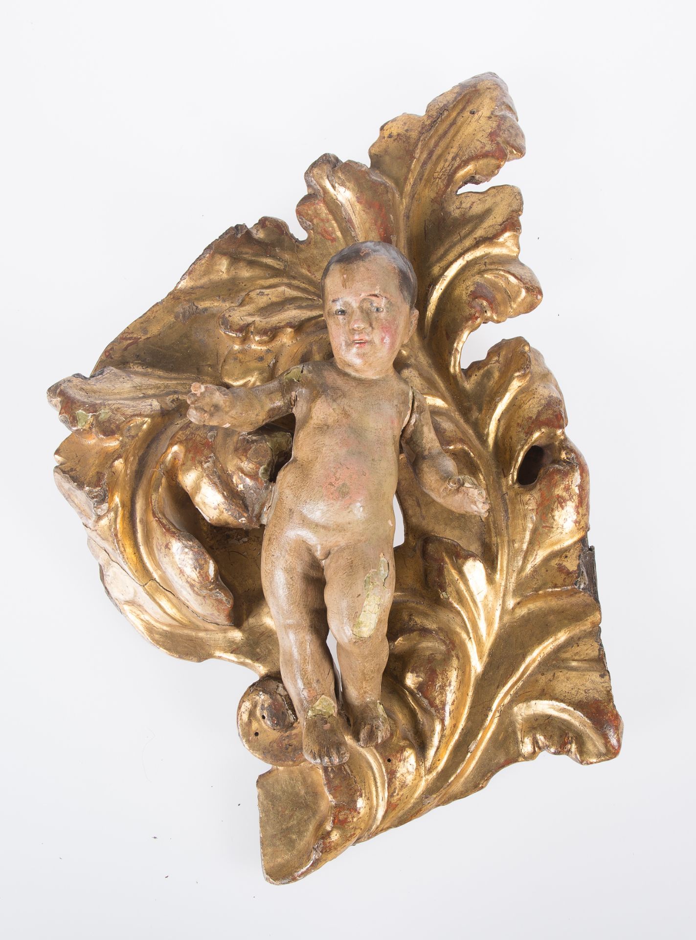 "Angel". Carved, gilded and polychromed fragment of a reredos. 17th century.