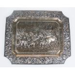 Large, ornamental, embossed and chased silver tray. 19th century.