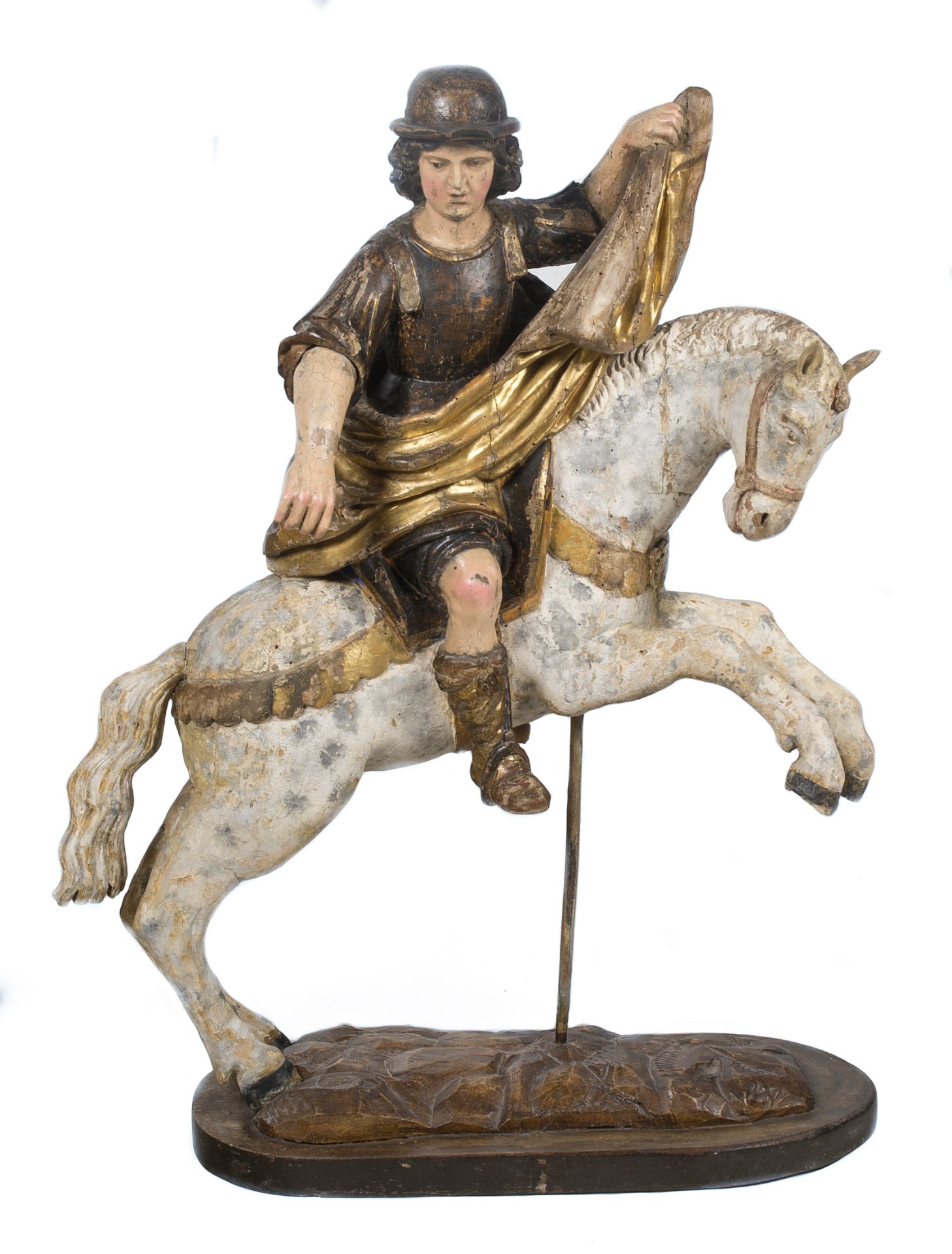 "San Martín". Carved, gilded and polychromed wooden sculpture. Colonial School. 17th century.
