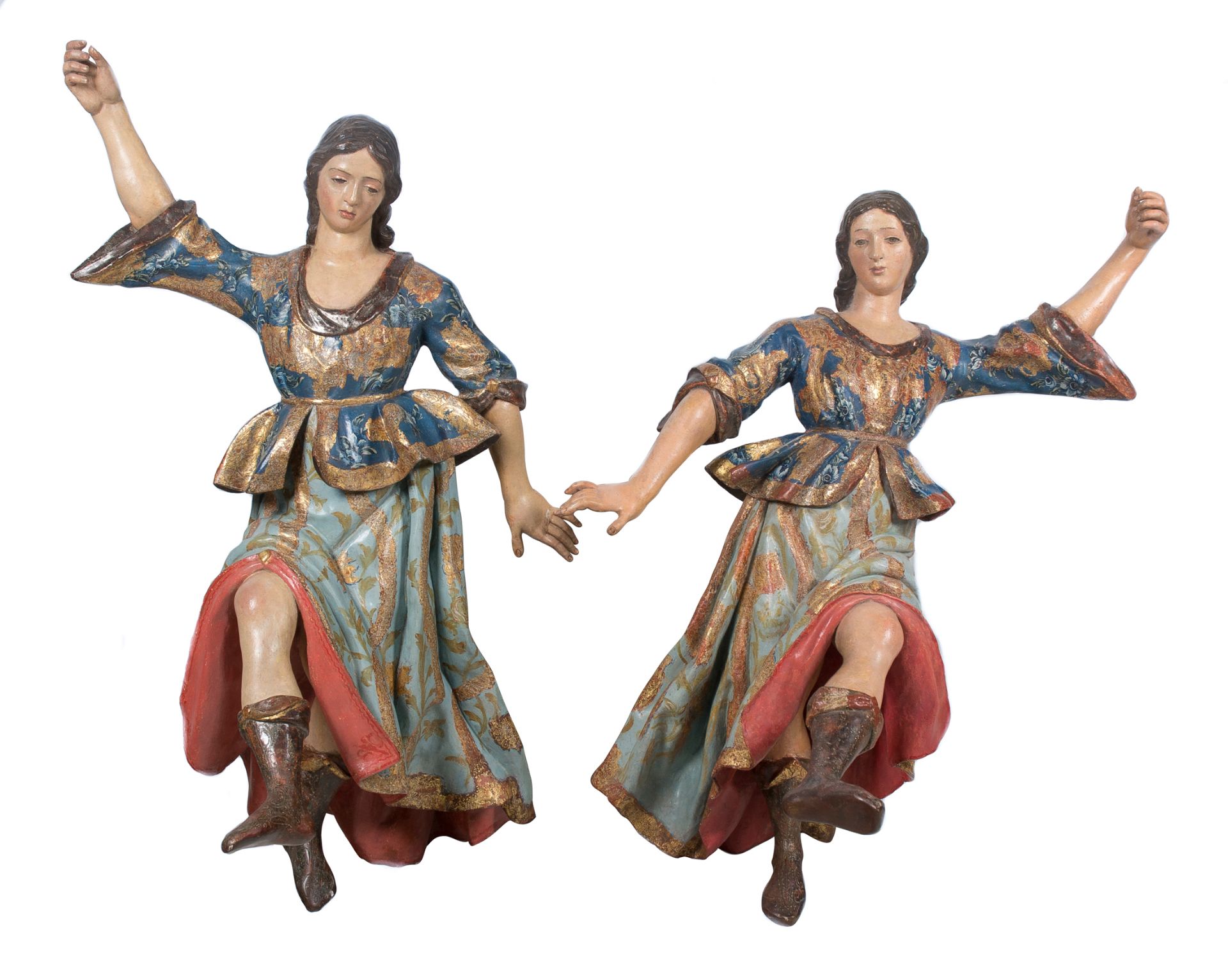 "Torch bearing angels". Pair of carved, polychromed, estofado technique and gilded wooden sculpture