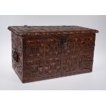 Carved cedarwood chest with iron fittings and polychrome residue. Colonial School. Peru. Late 17th