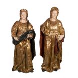 "Saints". Pair of large, carved, polychromed and gilded wooden sculptures. Colonial School. Peru.