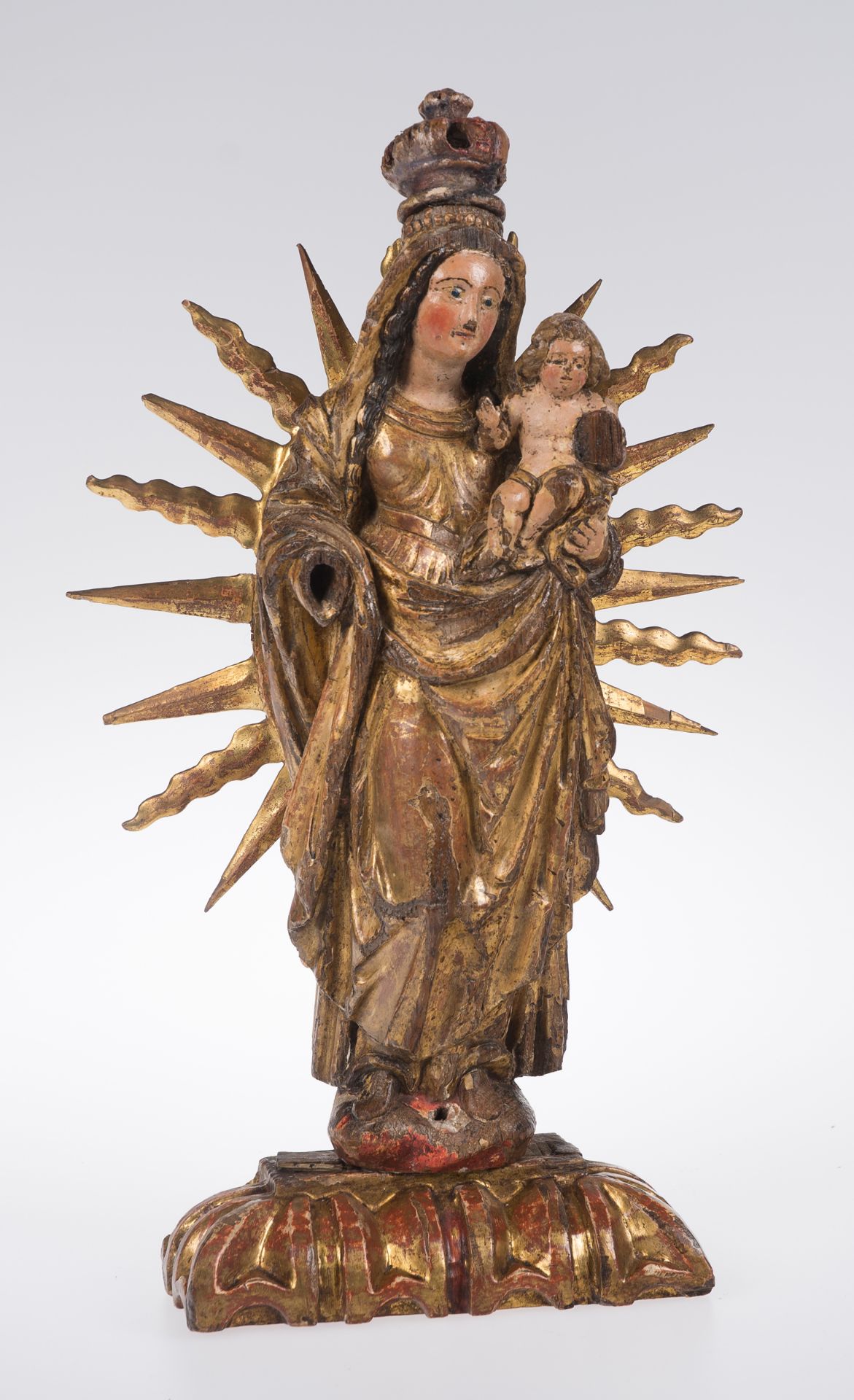 "Madonna and Child". Carved, gilded and polychromed wooden sculpture. Colonial School. Mexico or Pe
