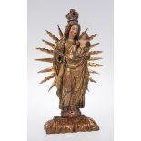 "Madonna and Child". Carved, gilded and polychromed wooden sculpture. Colonial School. Mexico or Pe