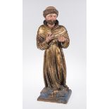 "Saint". Carved and polychromed wooden sculpture. 16th century.