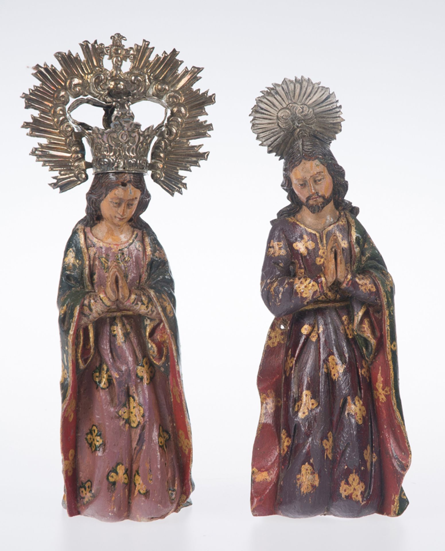 "Saint Joseph and the Virgin Mary". Pair of carved, gilded and polychromed wooden sculptures. Colo