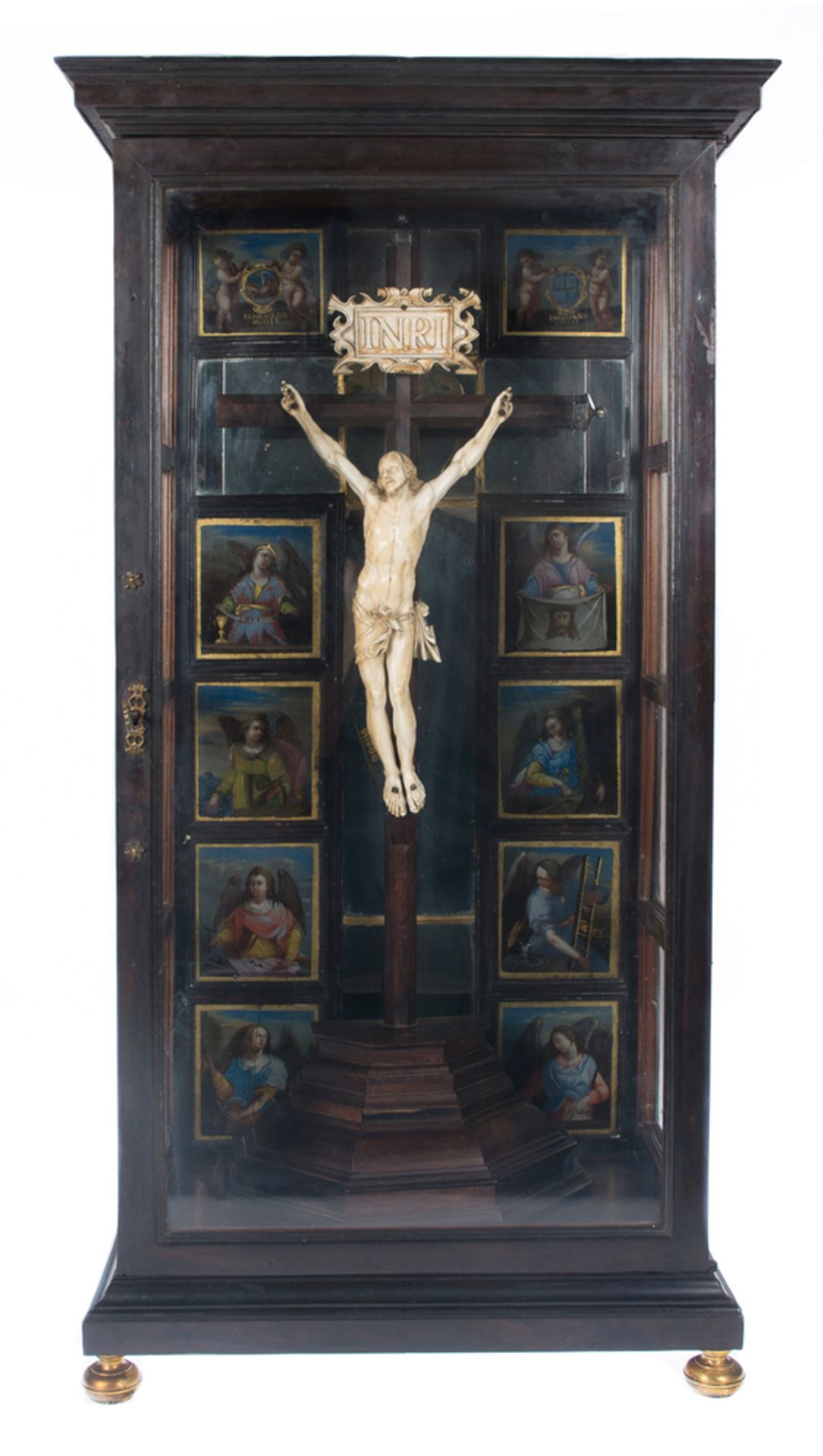 Ebonised wooden shrine with painted glass panes and an ivory Christ. Italy. 17th century.